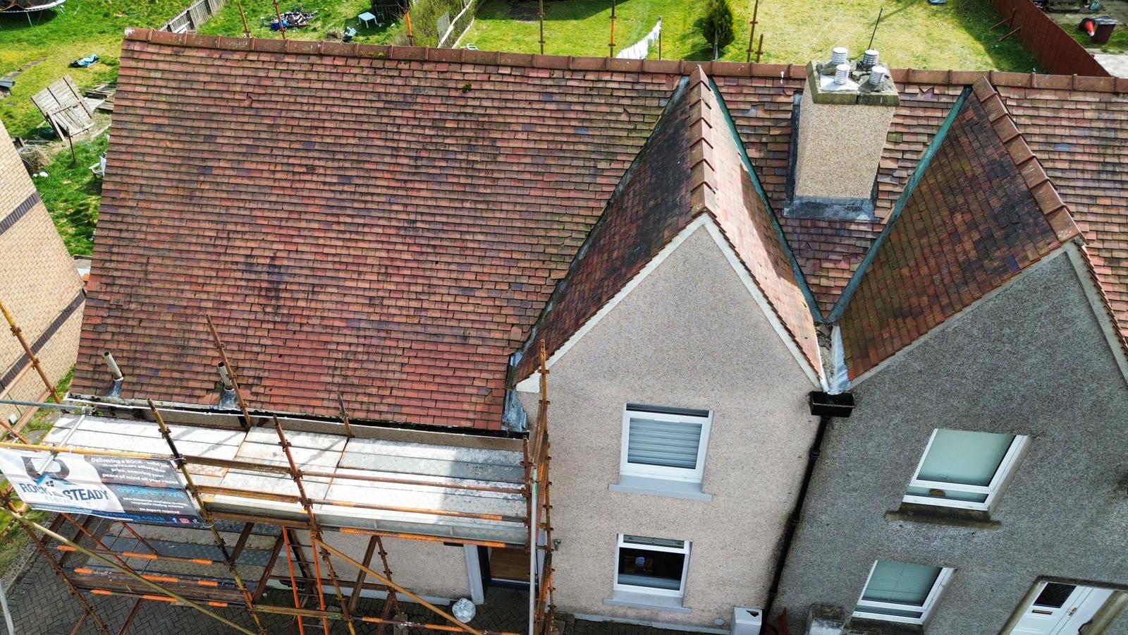 Before — weathered roof awaiting replacement
