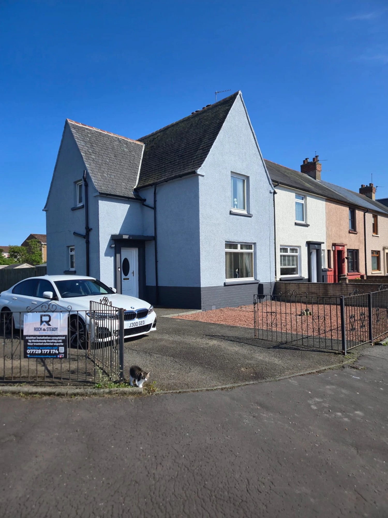 After — freshly coated white home by Rocksteady